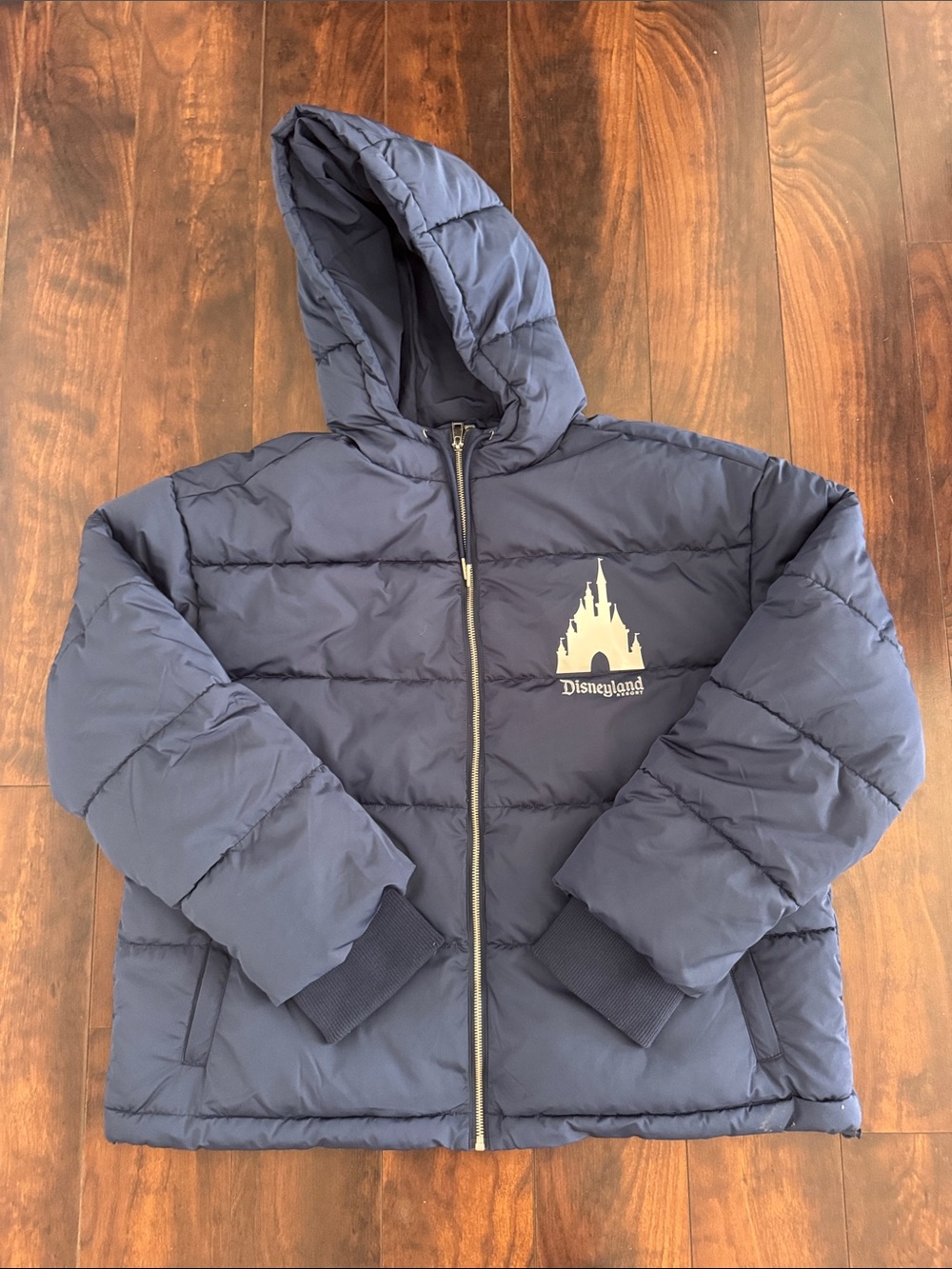 Disney Disneyland Resort Hooded Puffer Jacket in Navy with Silver Castle Logo